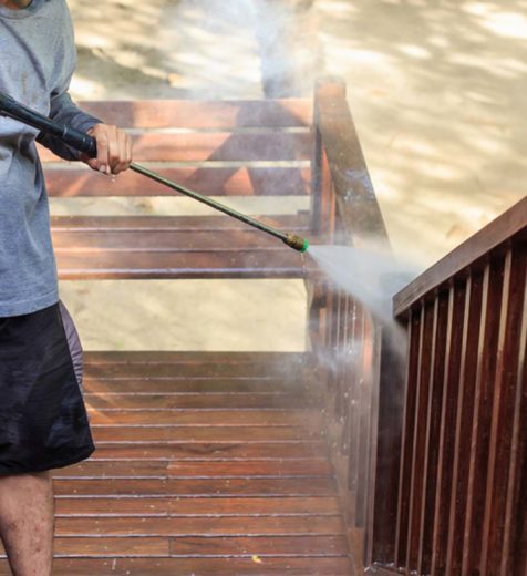 man doing a pressure washing